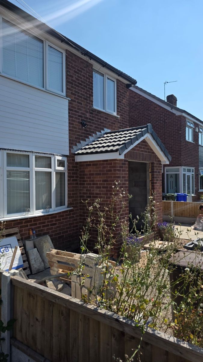 Completed brick porch with finished tiled roof